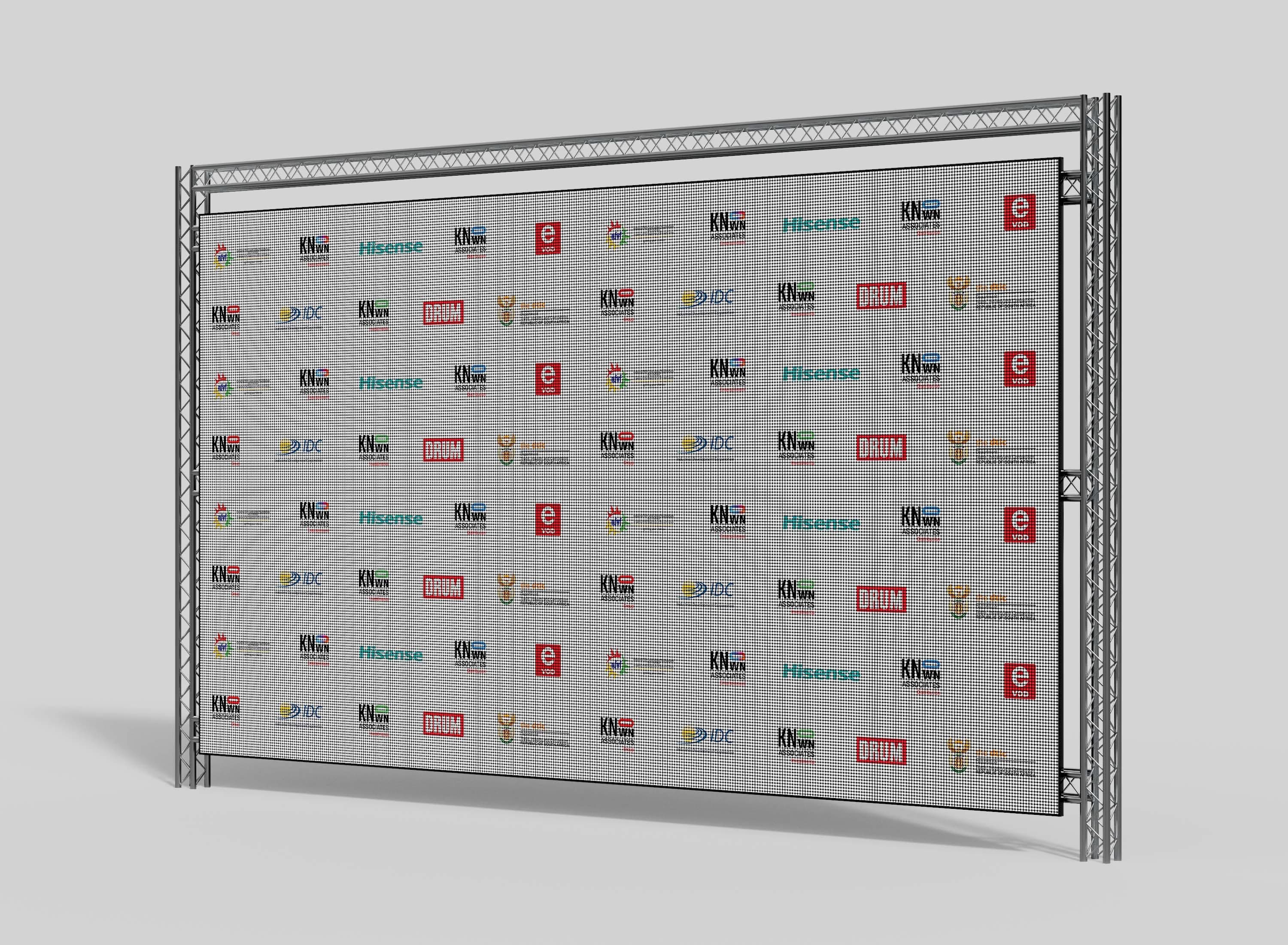 Sponsor media wall presented on a truss frame, tiling the Dear Sis Dolly production partner and funder logos across a mesh banner.